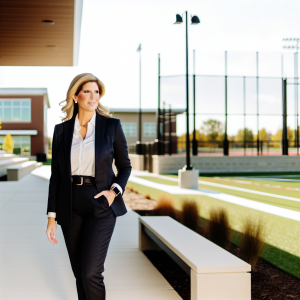 Entrepreneur and community leader near a sports field and school campus in Ohio